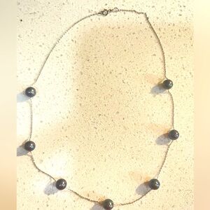 White gold necklace with black pearls. Delicate and light. Beautiful pie…